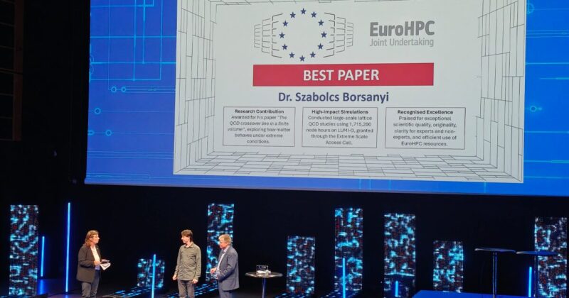 Image: Josephine Woods (left) and Anders Dam Jensen (right) awarding Dr. Szabolcs Borsanyi for the Best Paper Award at the EuroHPC User Days 2025. Copyright: Zuzana Cervenkova, IT4Innovations.